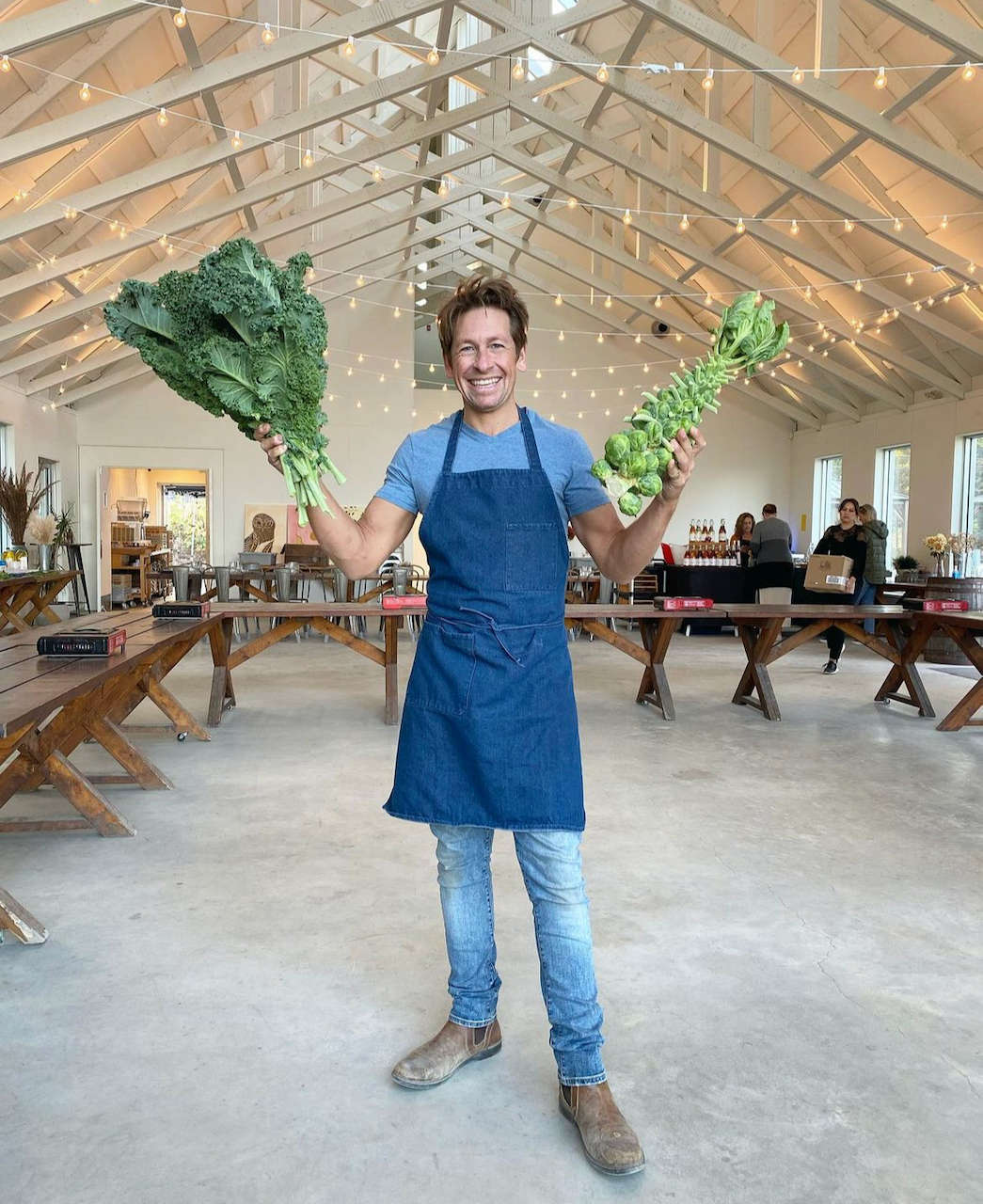 Chef holding vegetables for cooking class